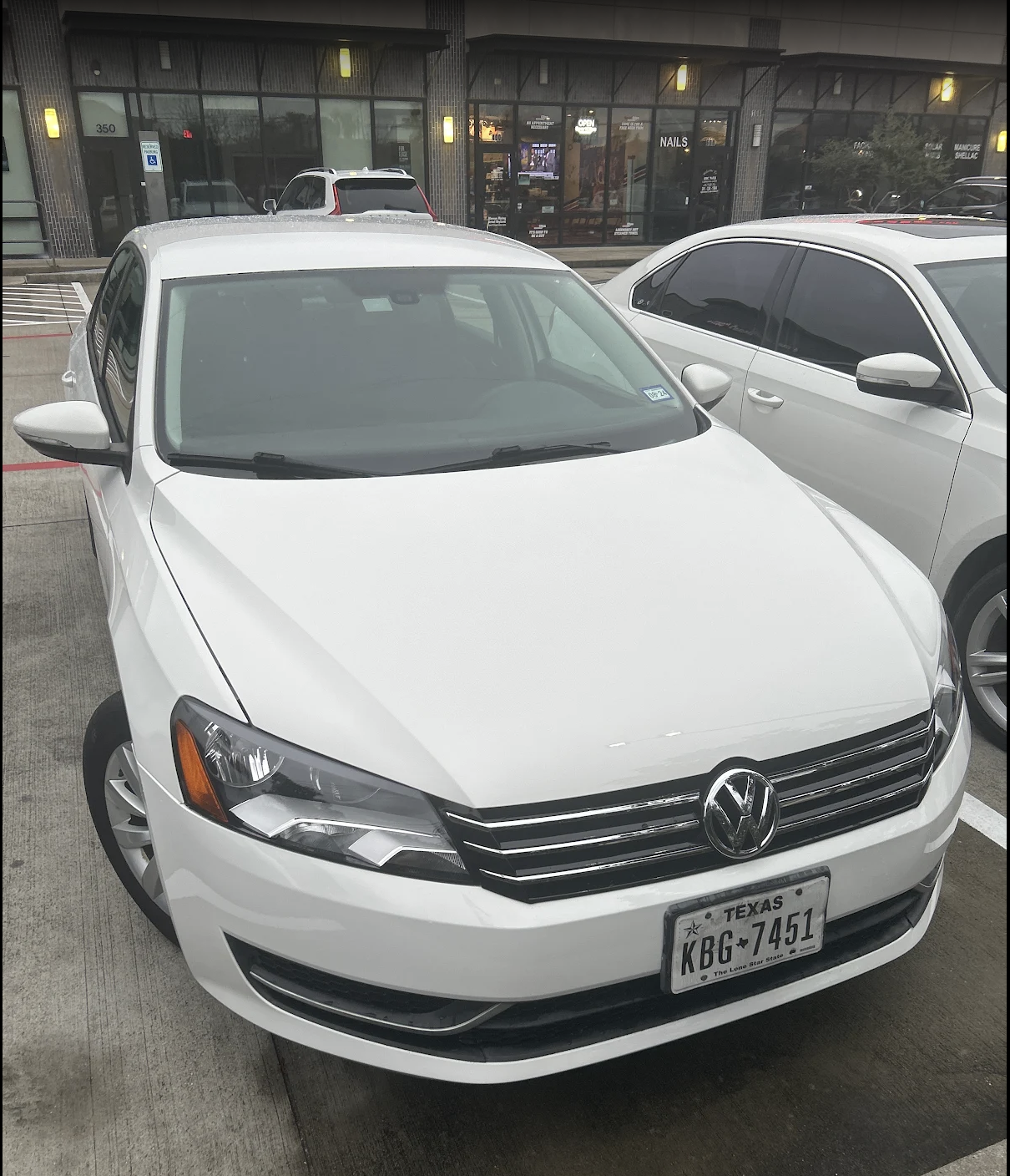 Volkswagen Passat after repair at George's Paint & Body Shop